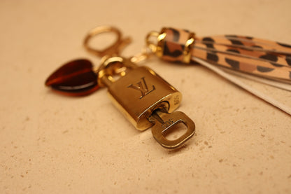 Louis Vuitton Lock & Key Amber Heart Leopard Bag Charm | No. 309