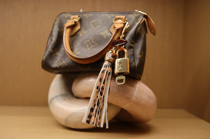 Louis Vuitton Lock & Key Amber Heart Leopard Bag Charm | No. 309