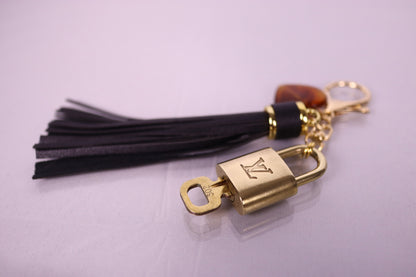 Louis Vuitton Lock & Key Amber Heart Black Bag Charm | No. 302